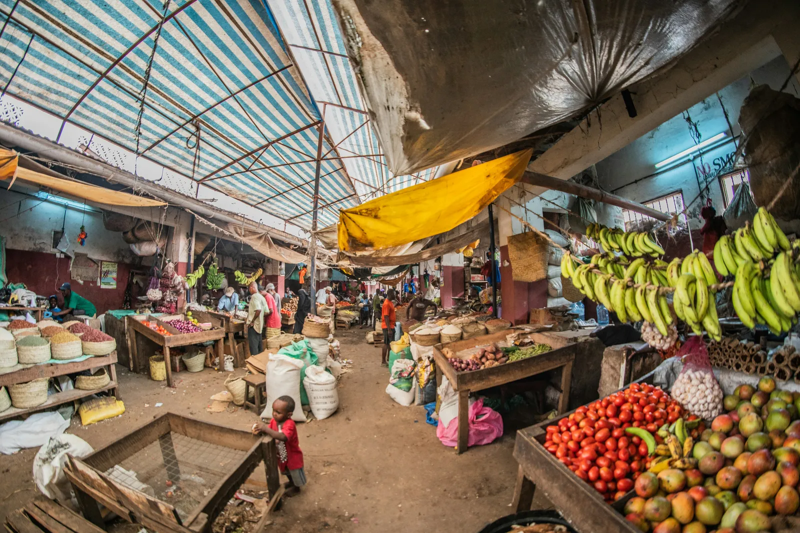 Fresh produce piled high at a Zanzibar market stall